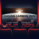 An illustration of people in movie theatre seats with the film image on the screen in front of them - a view of the sun rising beyond earth from space and the title Chasing Carbon Zero.